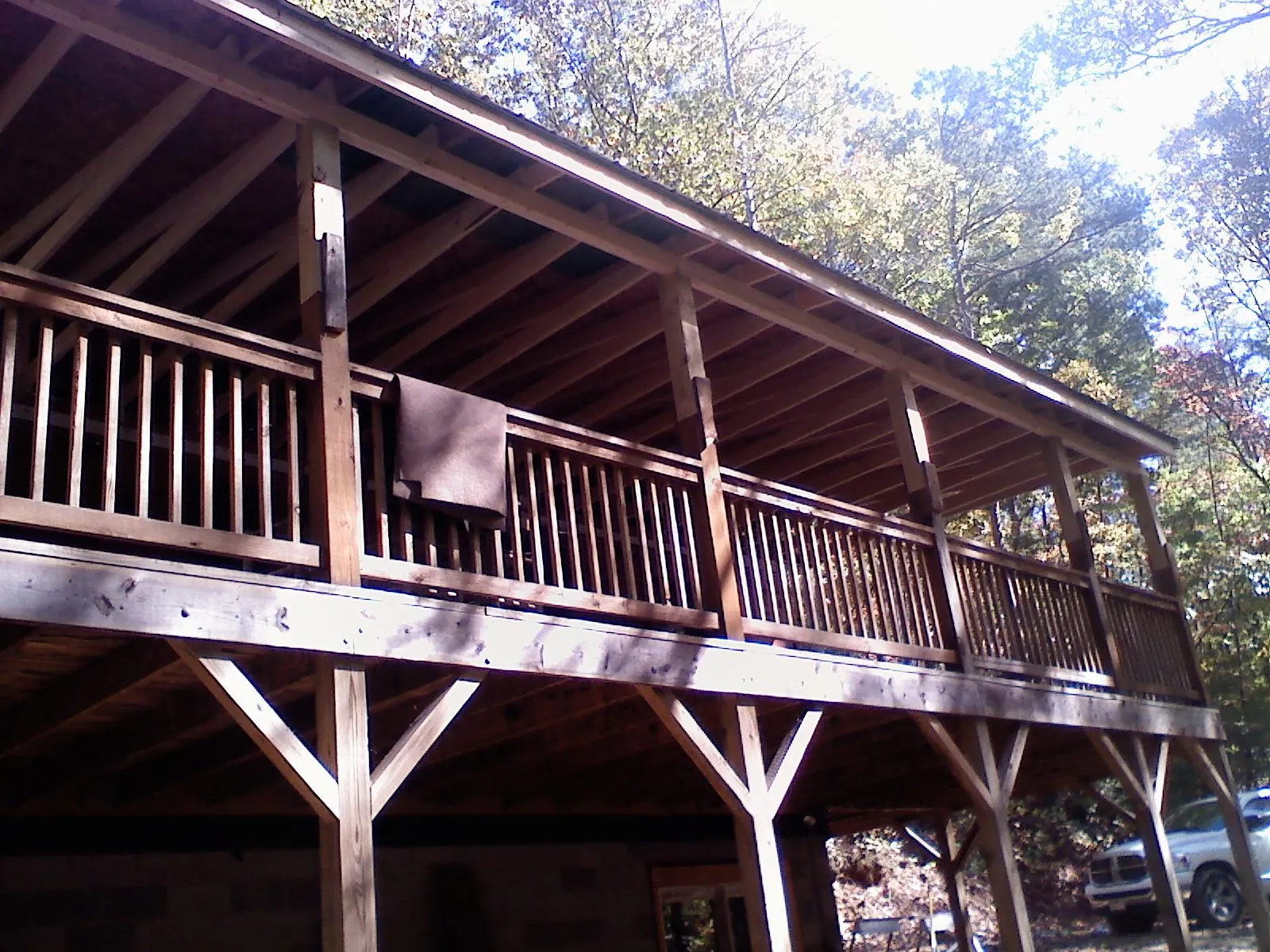 Timber framing under a new elevated porch and deck — Roof Leak Repair in Somonauk by Roofing Brothers